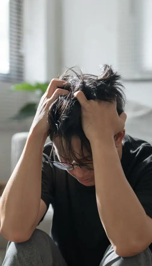 Image of upset man because of erectile dysfunction symptoms Derby